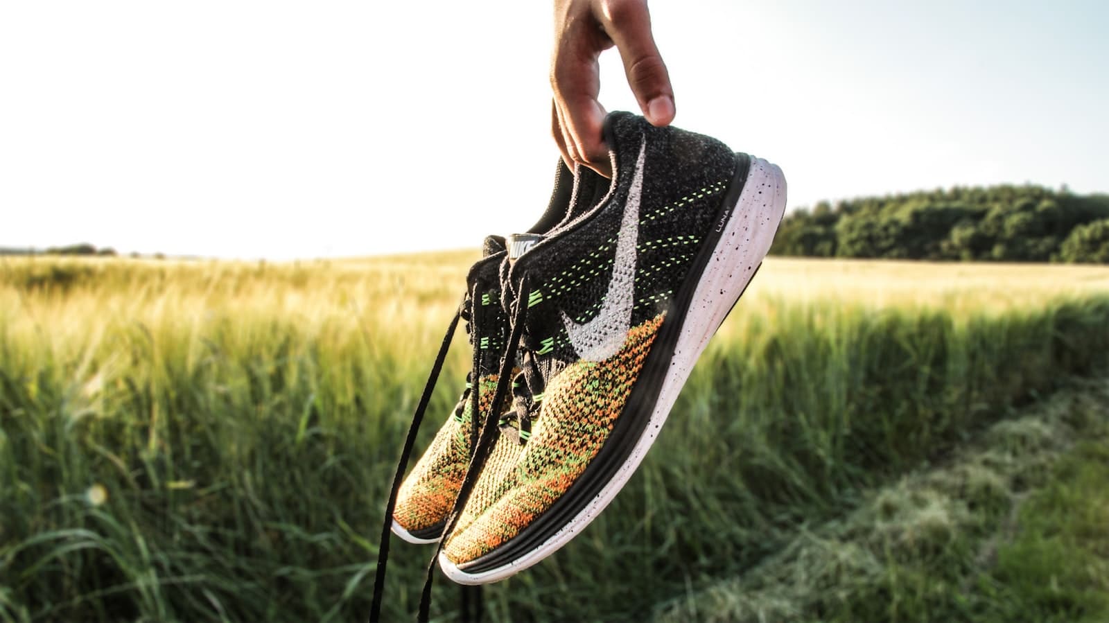 A pair of running shoes ready by the door